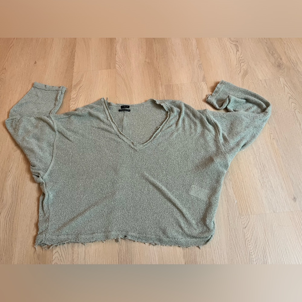 See through light green sweater